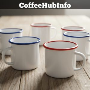 Close-up of white enamel retro coffee mugs with blue and red rims